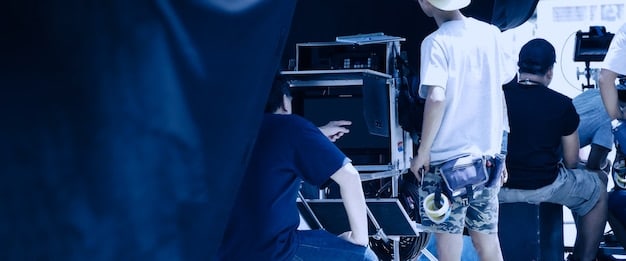 A behind-the-scenes shot of a reality TV set being dismantled, with crew members taking down equipment and props. The atmosphere is somber and reflects the end of a production.