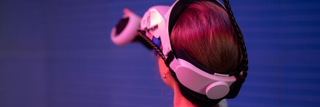 A close-up of a person wearing a VR headset, fully immersed in a virtual concert experience, with colorful visuals reflecting on the headset's screen. The background should be blurred, suggesting a comfortable home environment.