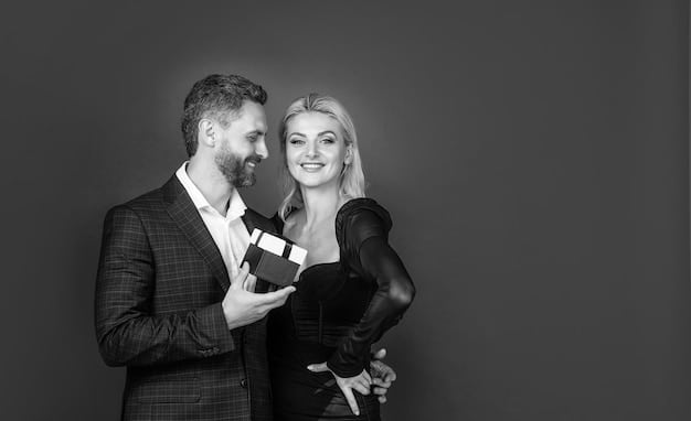 A black-and-white photo of Blake Lively and Ryan Reynolds laughing together at a red carpet event. Blake is wearing a stunning gown, and Ryan is in a classic tuxedo. The focus is on their joyful expressions and genuine connection, highlighting their playful dynamic.